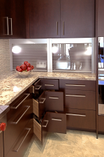 Glass tambour and corner drawers