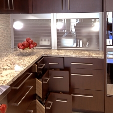 Glass tambour and corner drawers